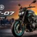 Yamaha MT-07 parked on a city street at sunset, highlighting its aggressive naked bike design for a detailed review.